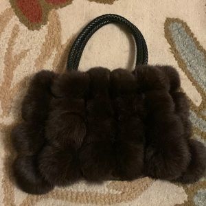 Fur Pom Pom Clutch with crosshatched handles